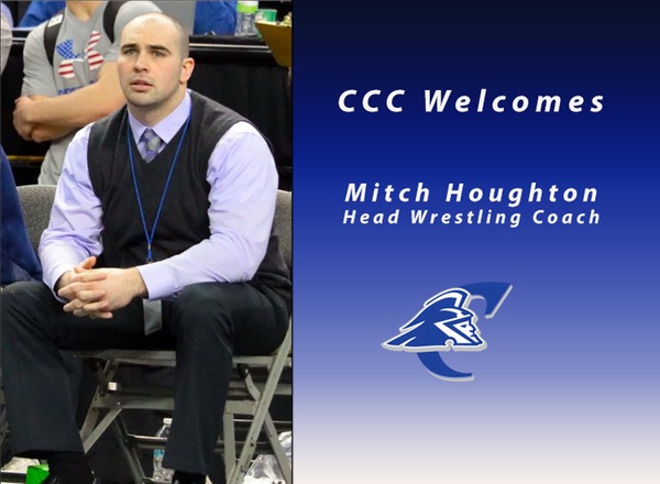 Colby Community College hired Mitch Houghton as the Trojans head wrestling coach.